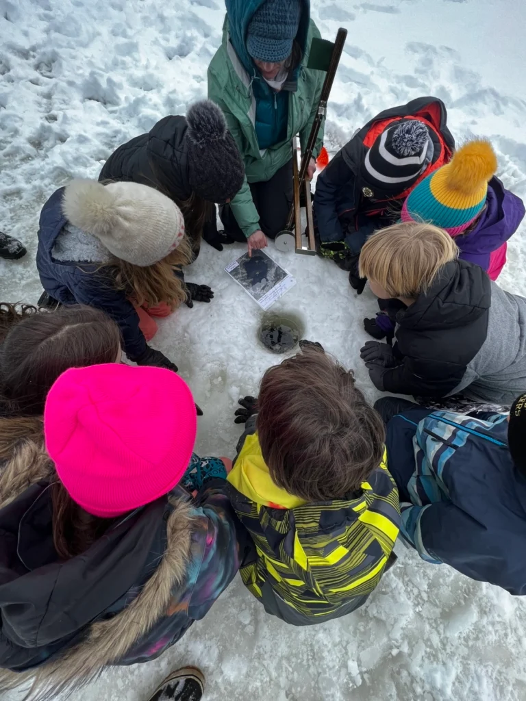 Land Trust fishes with Students for WinterKids