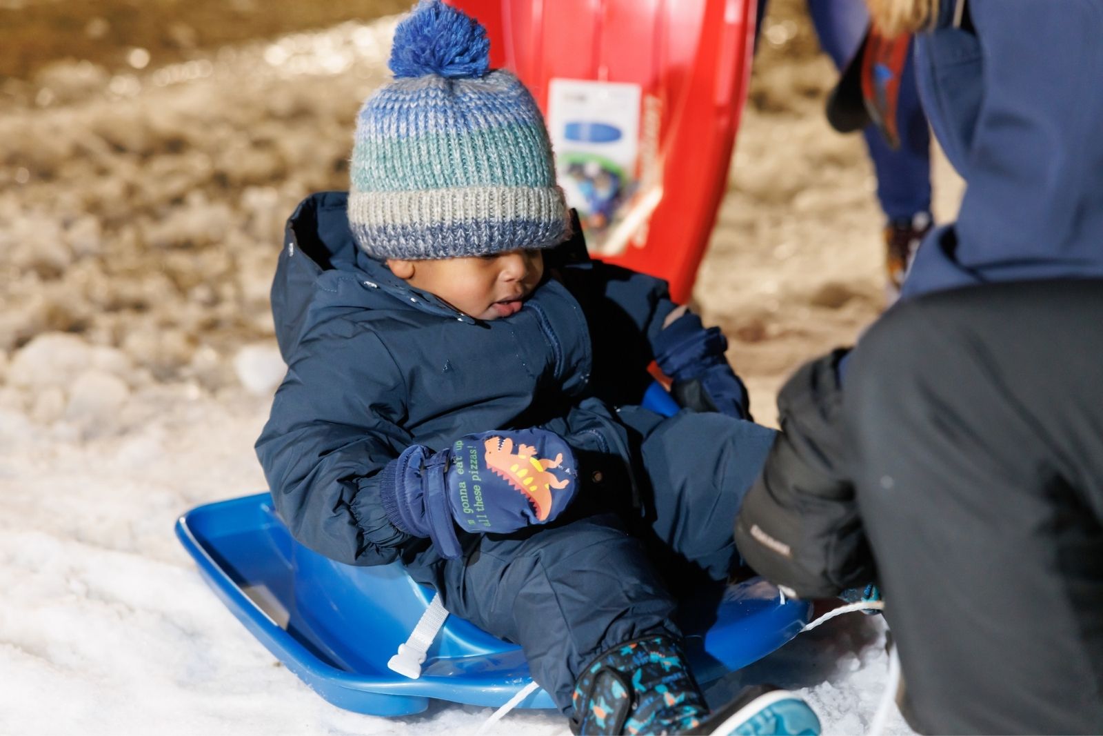 Children receive free sleds, courtesy of Flexible Flyer at WinterKids’ Welcome to Winter celebration. | CAMA7436 SDP Photo