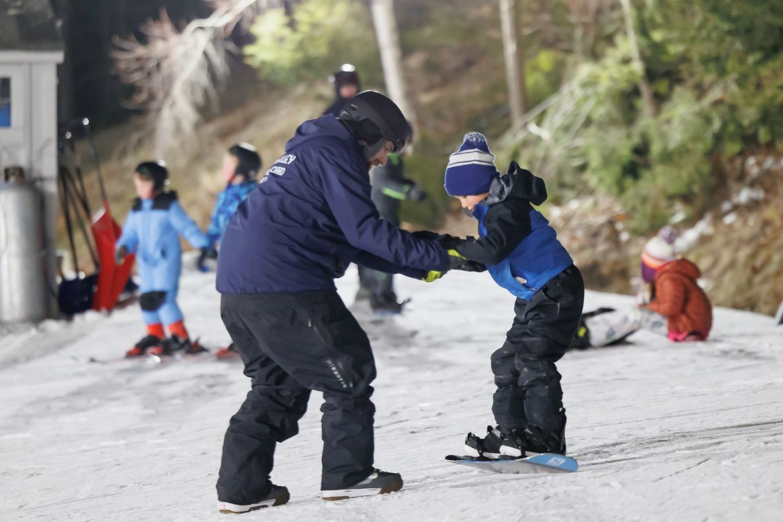 Kids learn to snowboard with help from Lost Valley instructors during WinterKids’ Welcome to Winter celebration. | CAMZ1378 SDP Photo
